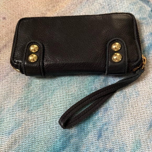 Women's Linea Pelle "Dylan" Zip Around Wallet in black soft leather. - Picture 2 of 7